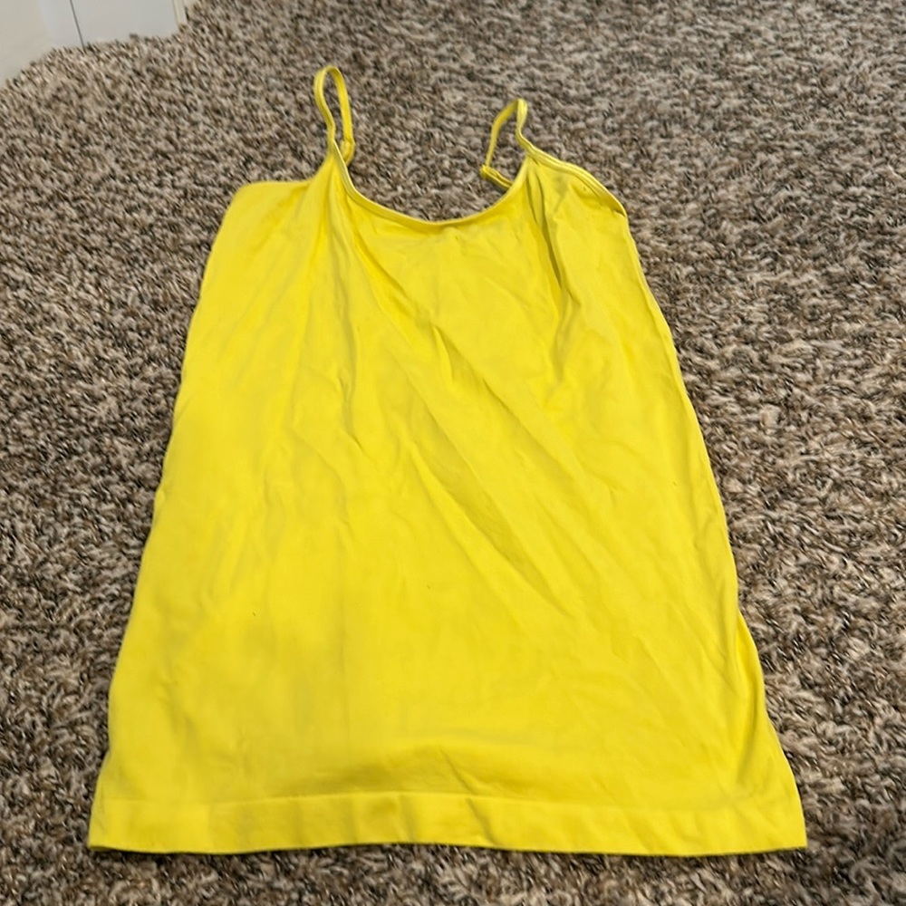 Yellow adjustable straps tank top. Washed but never worn. Medium